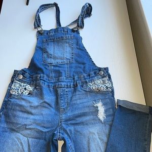 Medium wash overalls for girls with lace detailing and distressing